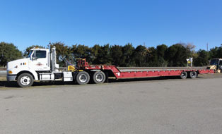 lowboy tractor trailer for track maintenance